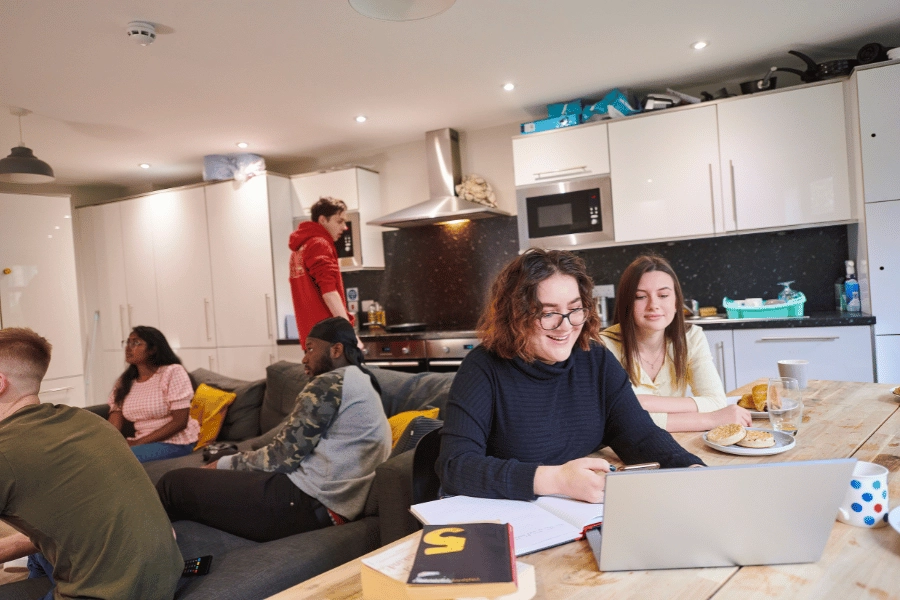 co-living space where residents are working and hanging out 